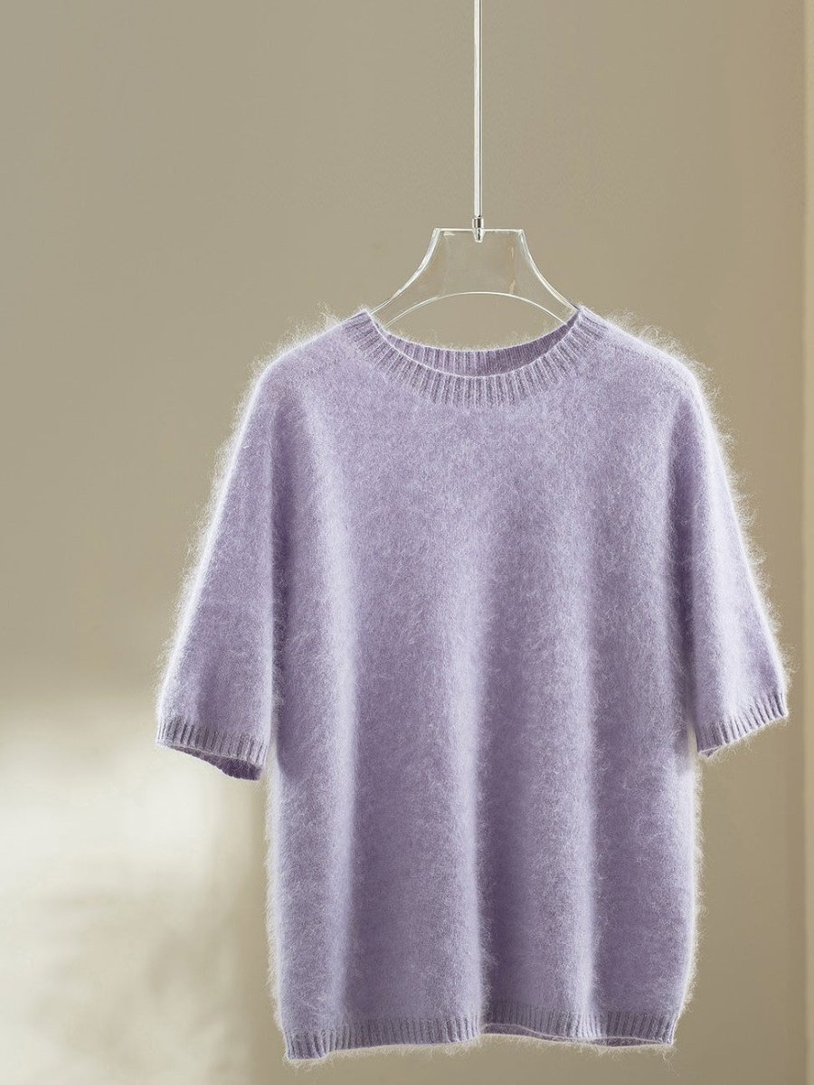 Lilac wool blend jumper with elbow-length puff sleeves on a hanger