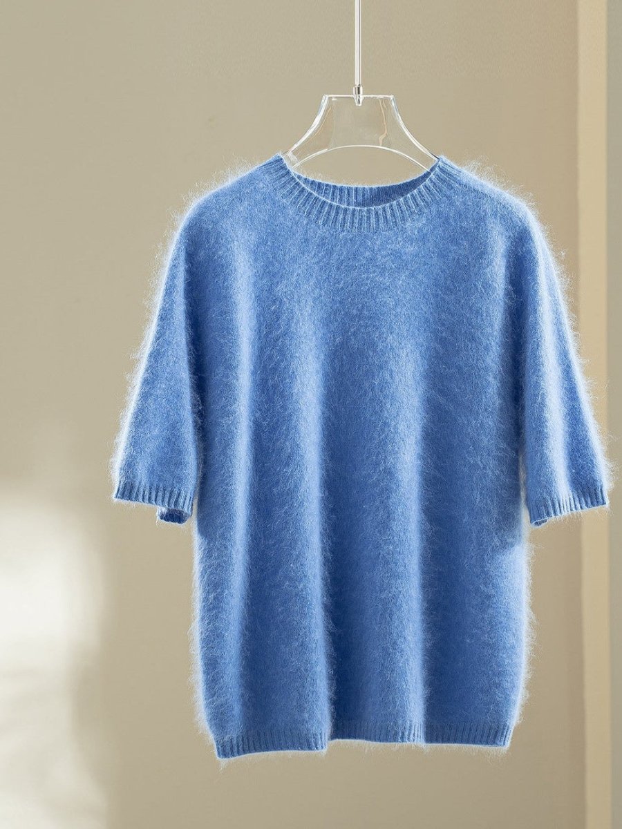 Cornflower blue wool blend jumper with elbow-length puff sleeves on a hanger