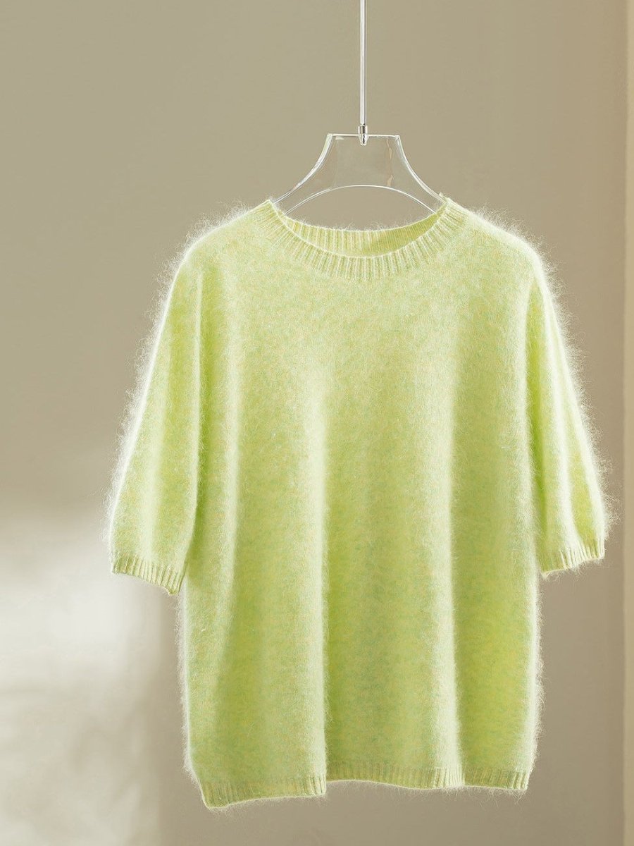 Lime wool blend jumper with elbow-length puff sleeves on a hanger