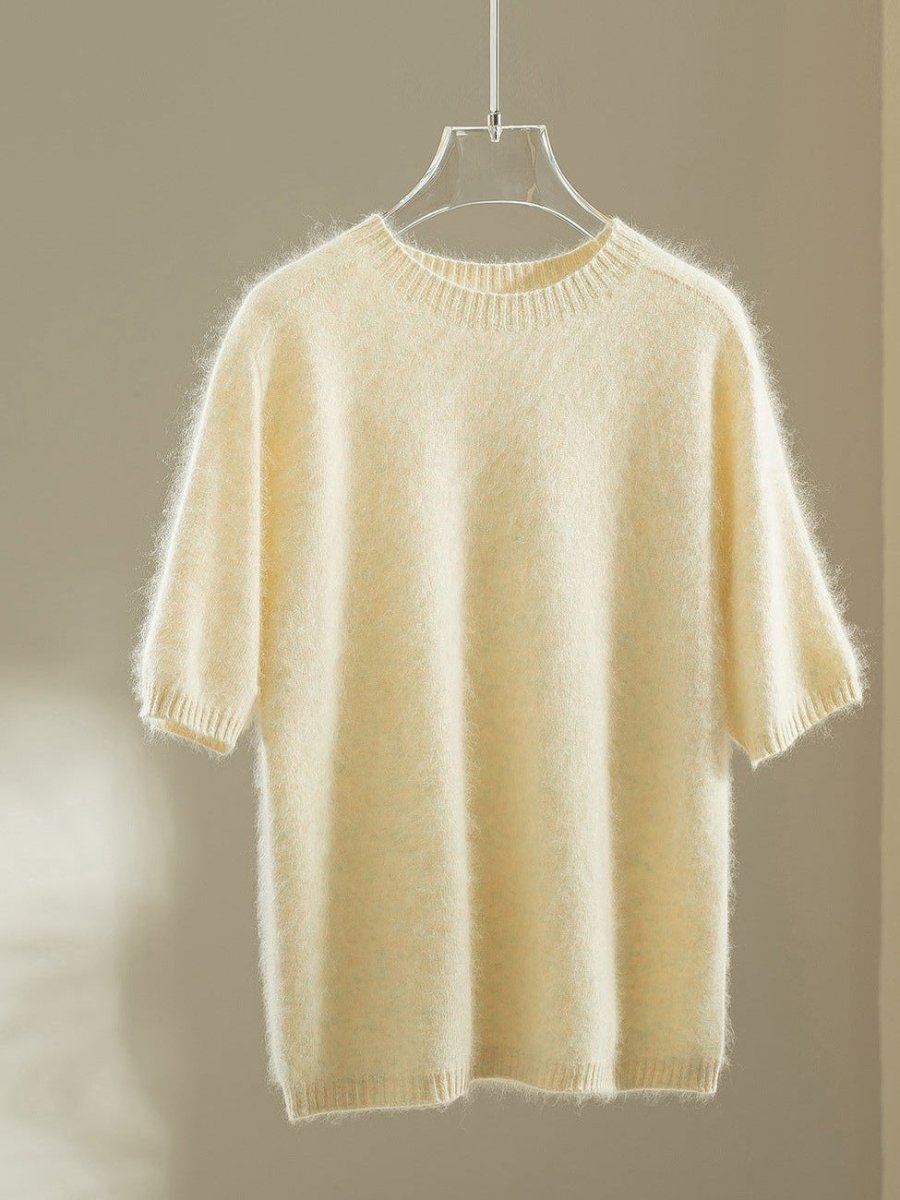 Vanilla wool blend jumper with elbow-length puff sleeves on a hanger