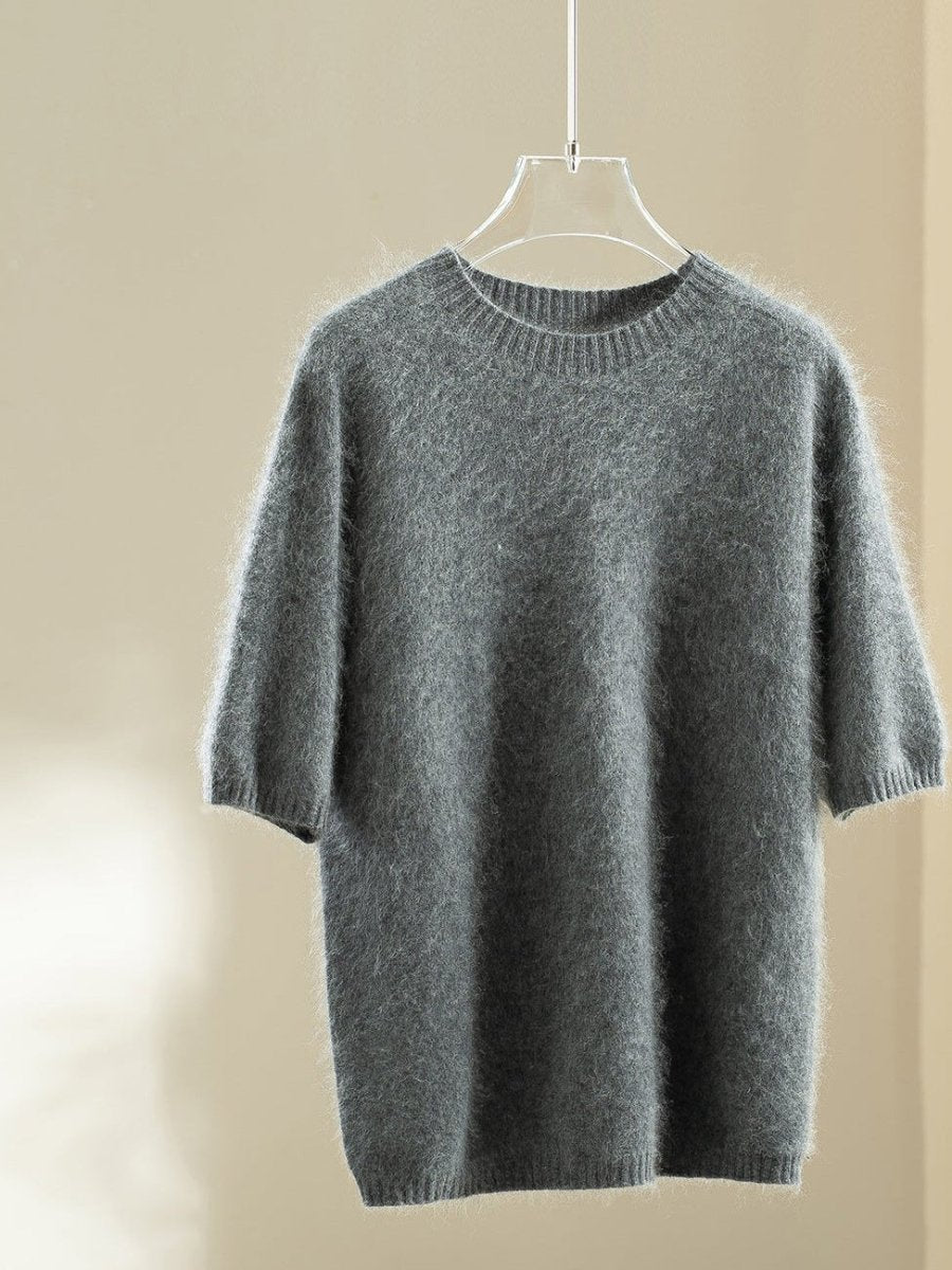 Charcoal short-sleeve wool blend jumper with puff sleeves on a clear hanger