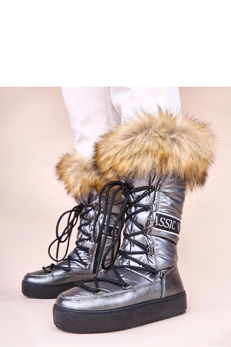 Boots styled with winter outfit