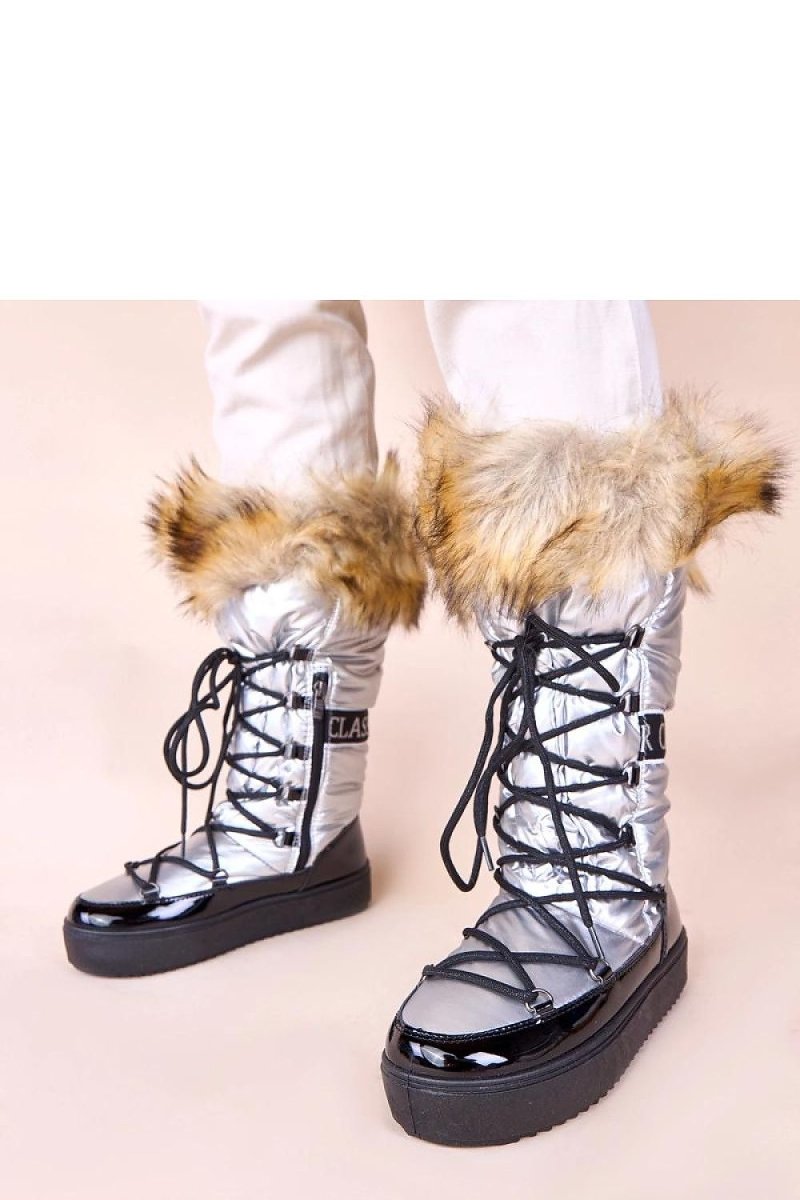 Snow boots in urban winter setting