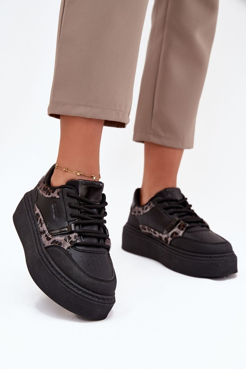Black platform sneakers from Step In Style, front view