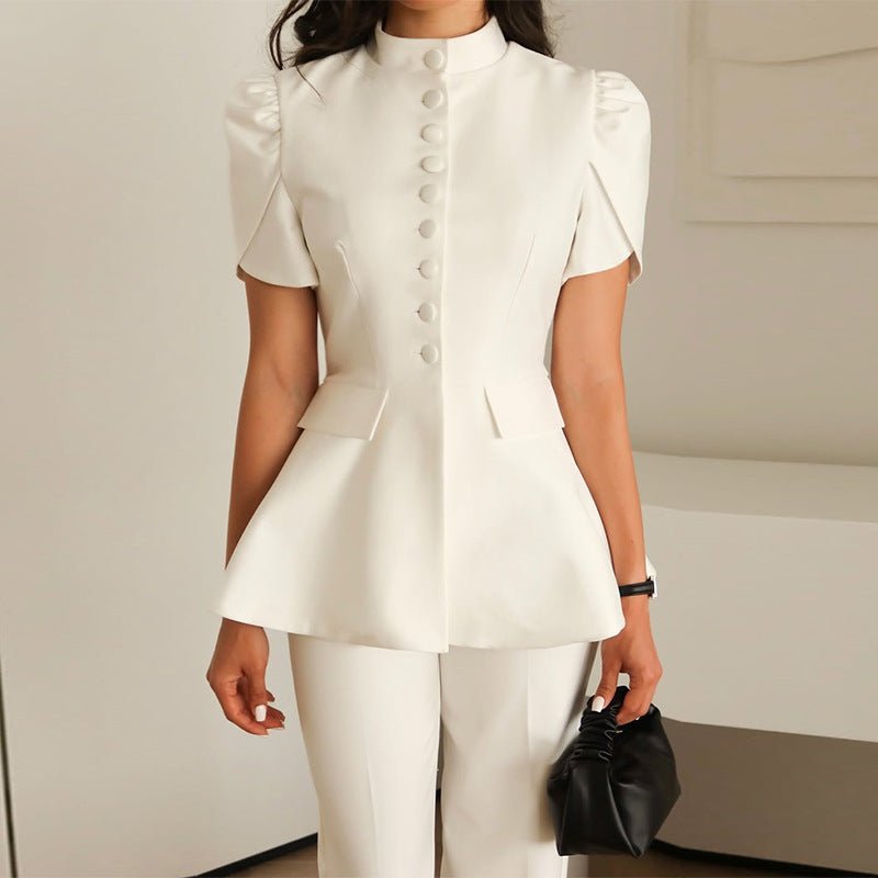 Front of the white peplum top with buttons
