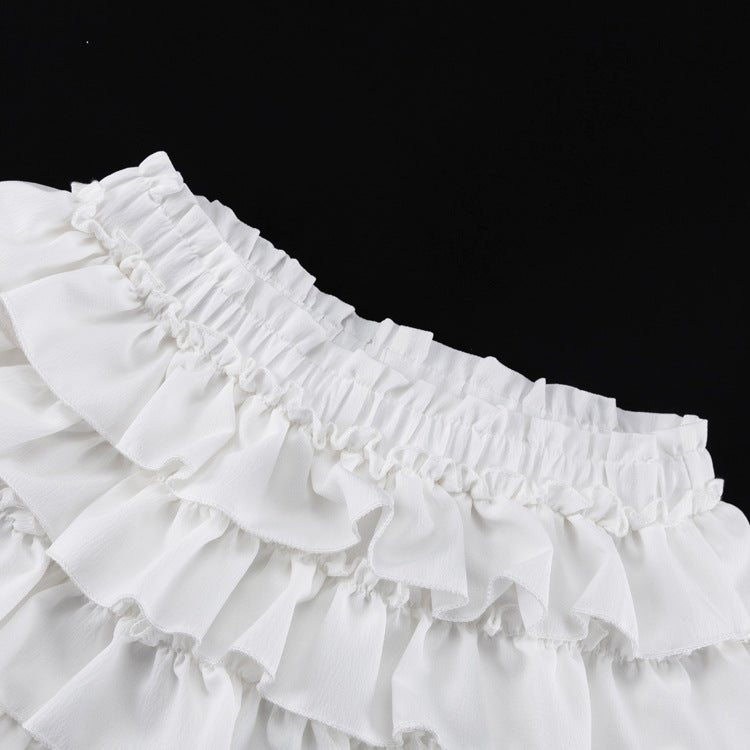 Close-up of the skirt's gathered elastic waistband and ruffle tiers
