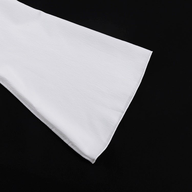 Bell-shaped sleeve end of the white top