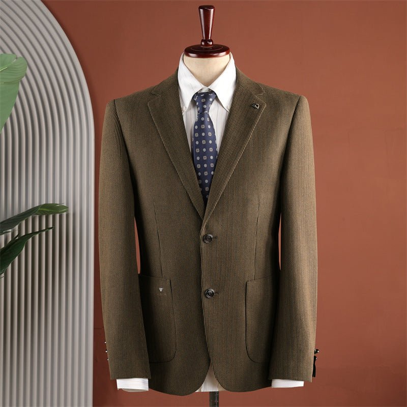 Coffee brown men's blazer with two buttons and patch pockets on a mannequin, with a white shirt and navy tie