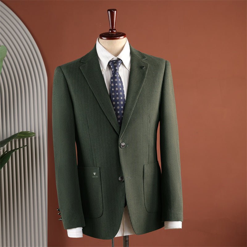 Green men's blazer with notch lapels and two buttons on a mannequin