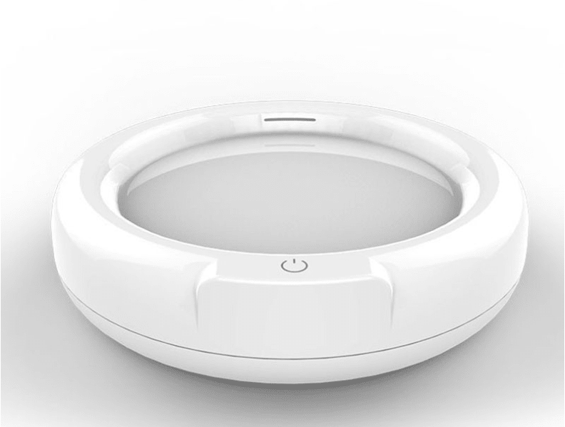 White round frother base seen from above, with the power button at the front