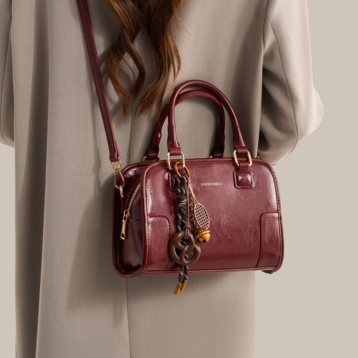 Vintage Style Barrel Crossbody Bag in brown PU leather with adjustable strap and brass hardware