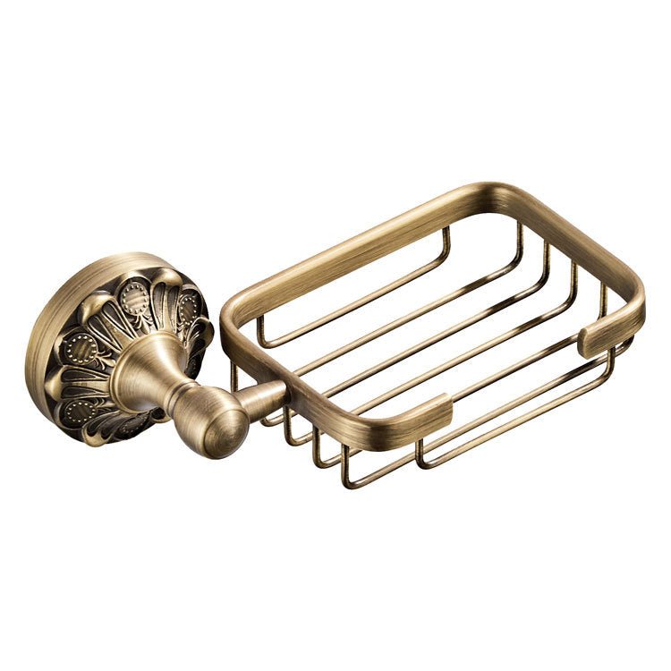 Empty wire soap basket with a round embossed wall plate, seen from the front