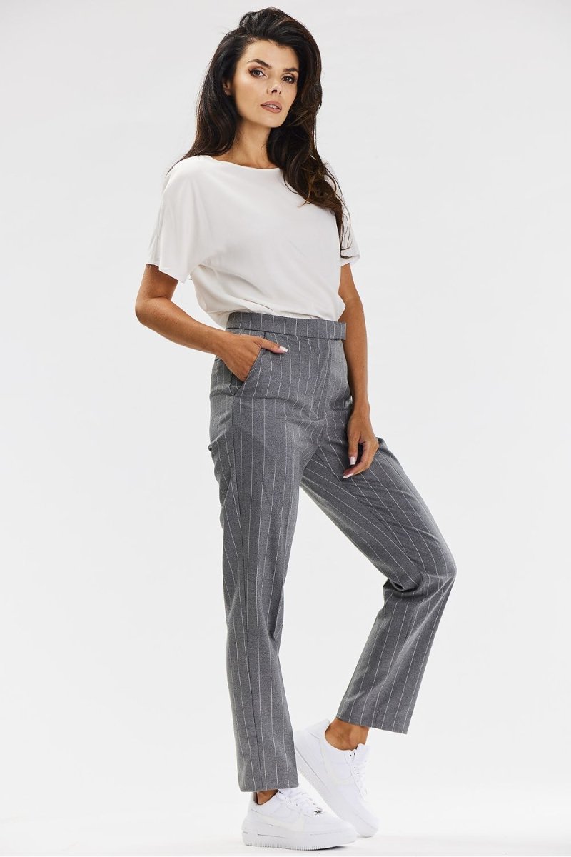 Close-up of pinstripe fabric texture and tailoring details