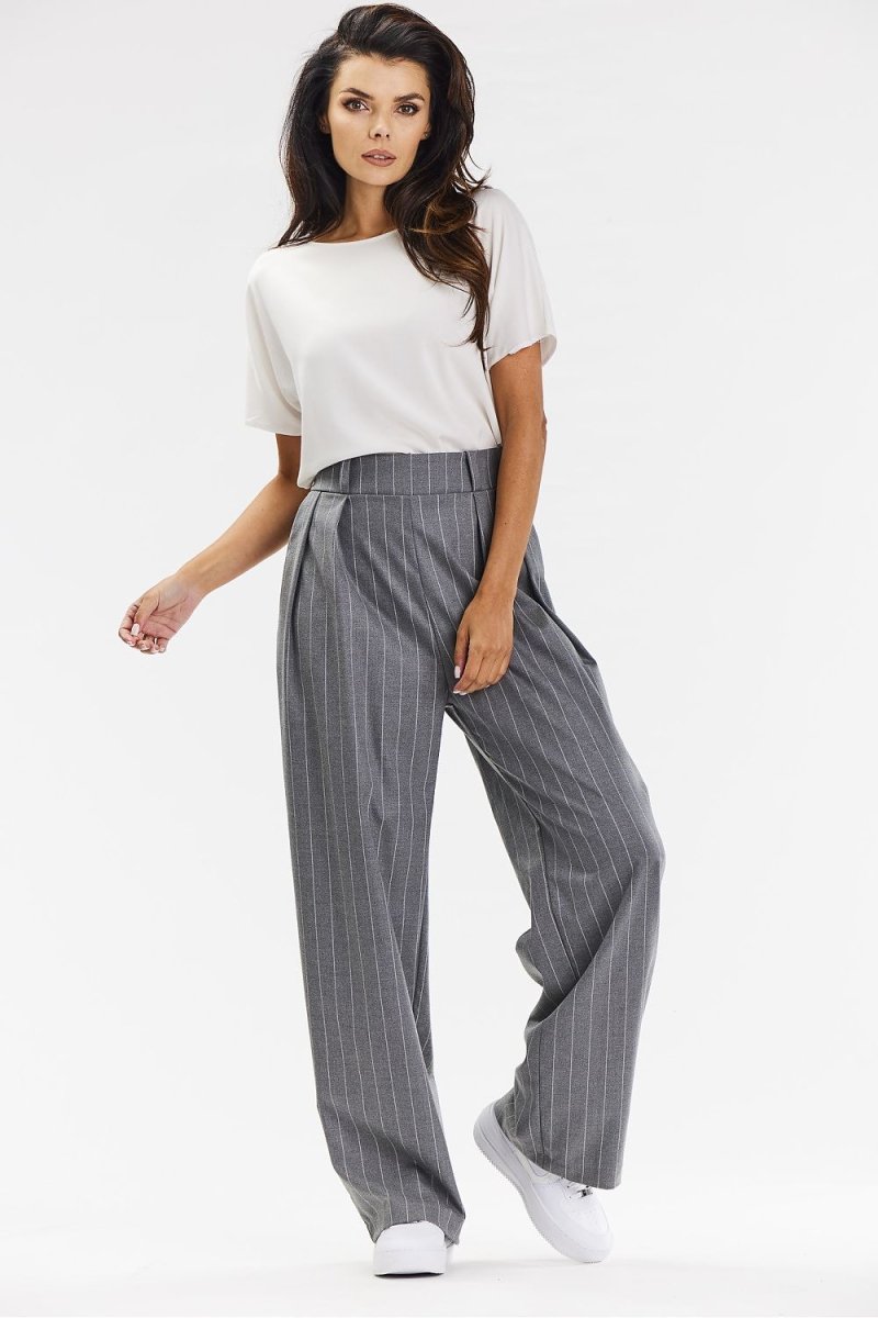 Grey wide-leg trousers with tailored waistband and flowing silhouette on a model — Elegant women's workwear from Awama