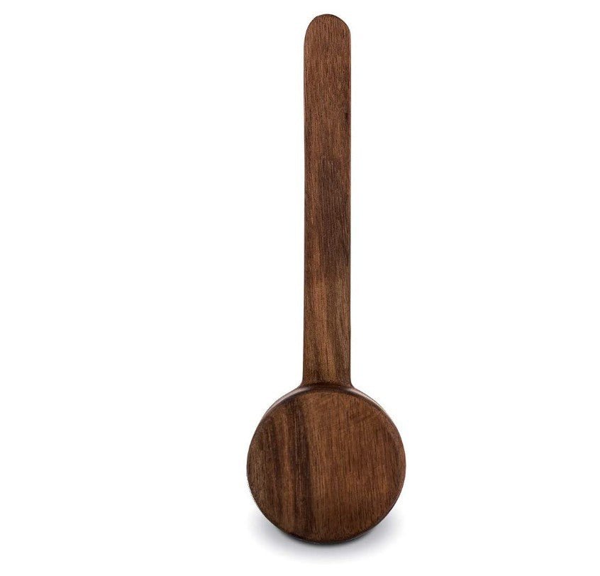 Wooden coffee bean scoop spoon, dark brown, front view, upright, on white background